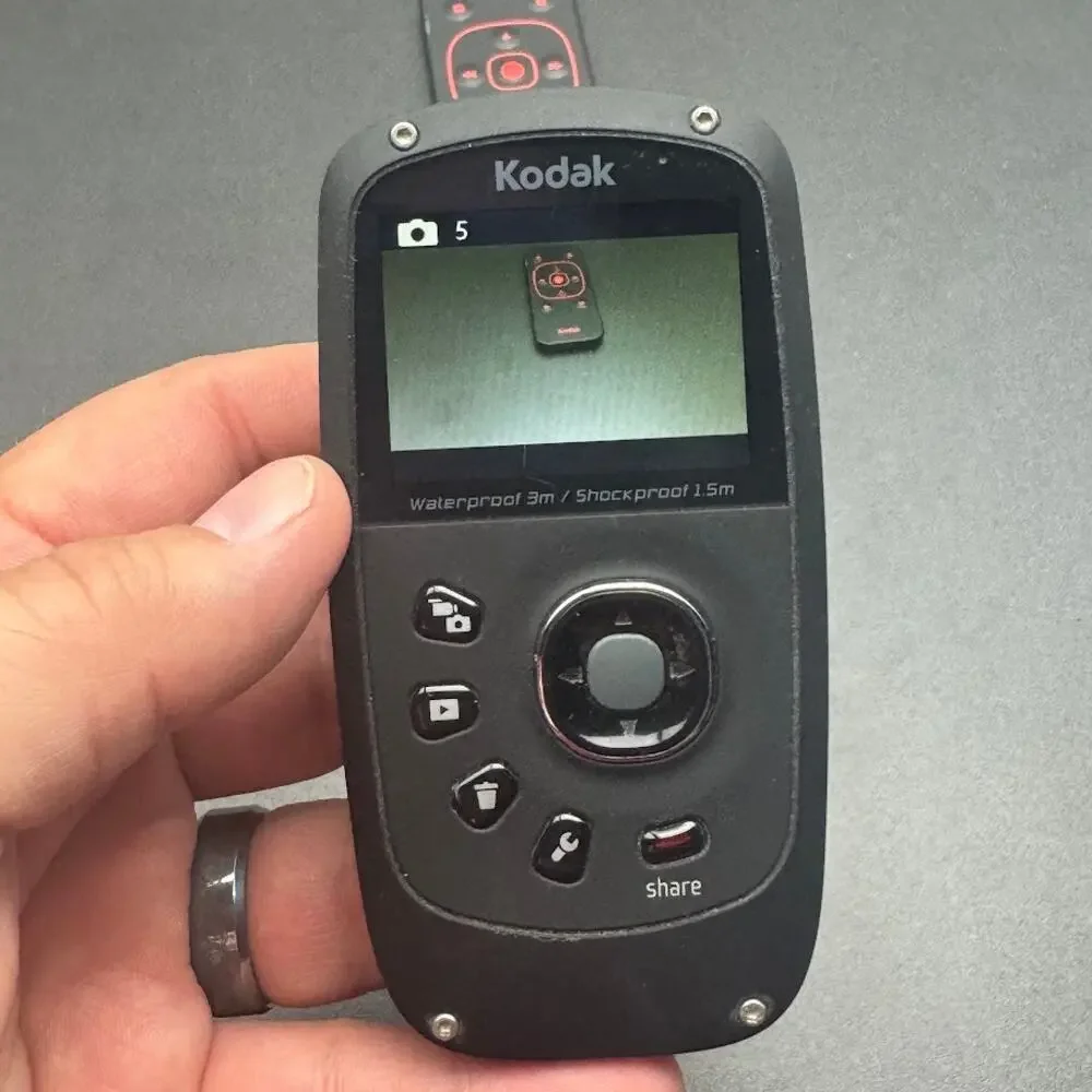Kodak PlaySport Digital Video Camera w/ Remote tested, working.